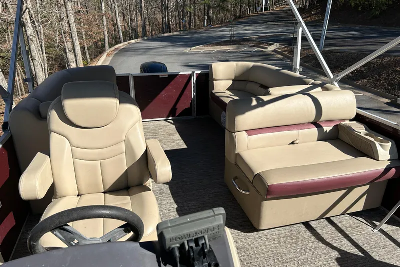 Slide: The Image of Interior of 2022 Godfrey Sweetwater 2286 C pontoon boat with beige seating. - 10