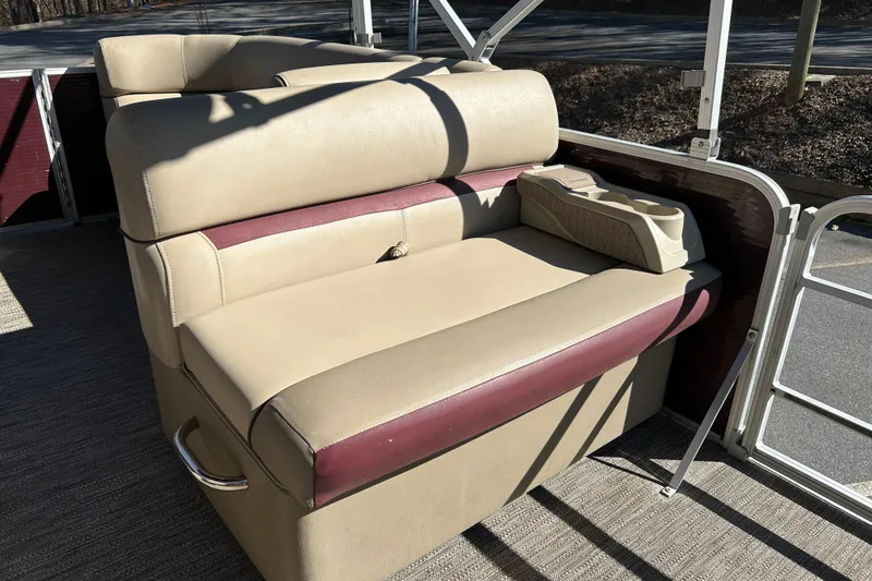 Slide: The Image of 2022 Godfrey Sweetwater 2286 C boat seating with beige and maroon upholstery. - 15