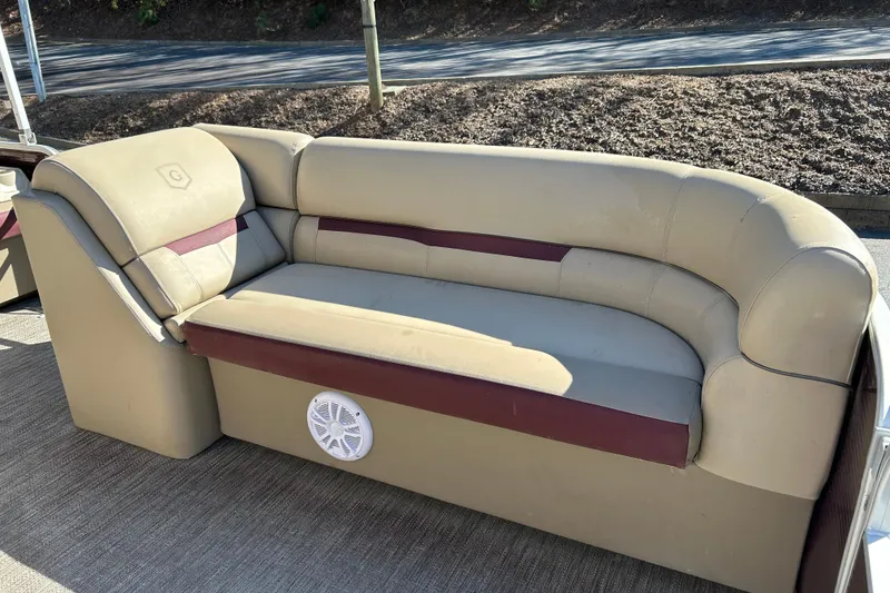 Slide: The Image of 2022 Godfrey Sweetwater 2286 C boat seating with beige and maroon upholstery. - 16