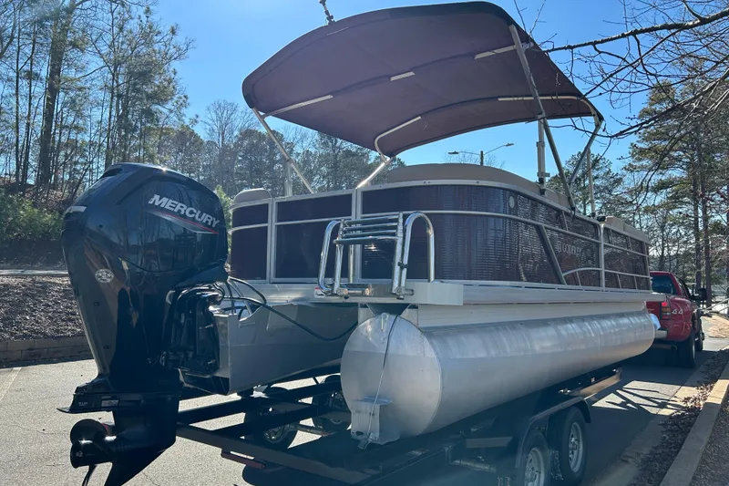 Slide: The Image of 2022 Godfrey Sweetwater 2286 C pontoon boat with Mercury engine on trailer. - 7