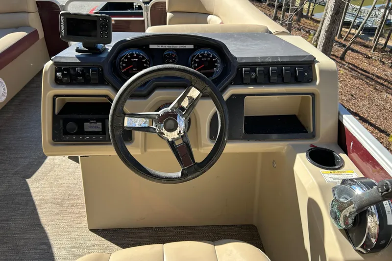 Slide: The Image of Steering console of 2022 Godfrey Sweetwater 2286 C pontoon boat with navigation equipment. - 8