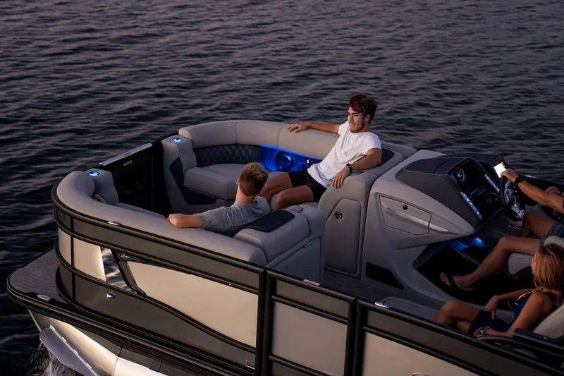 Slide: The Image of Luxurious Barletta LUSSO 25 UC boat on calm waters, 2026 model. - 4