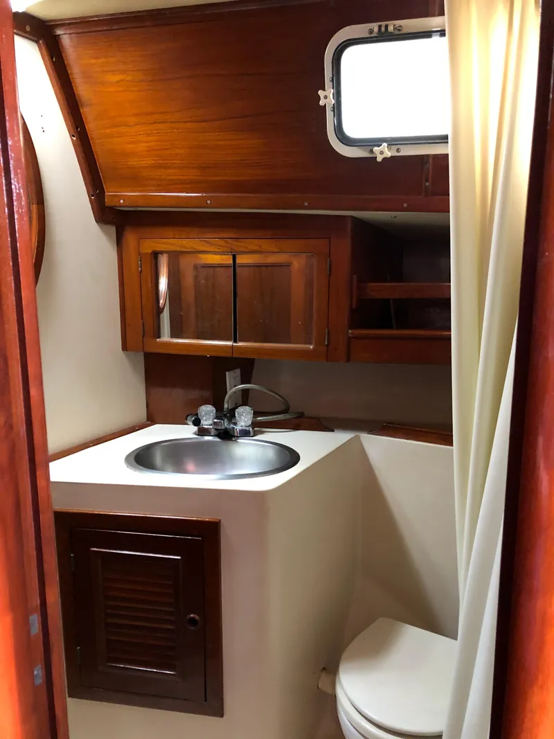 Slide: The Image of Endeavour Center Cockpit Sailboat 1984 - 8