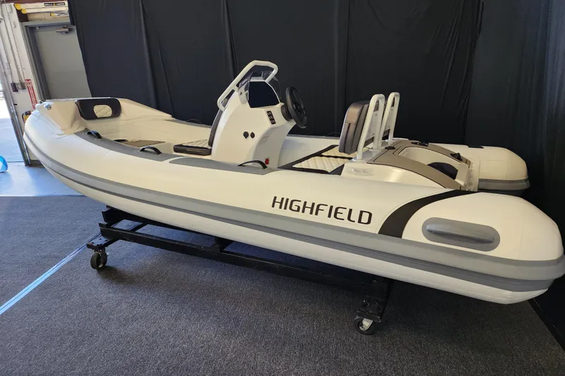The Image of 2025 Highfield Sport 390 inflatable boat on display indoors. - 0