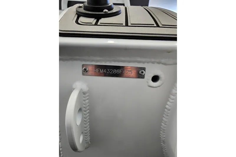 Slide: The Image of 2025 Highfield Sport 390 boat hull with identification plate, serial number HFM43286F425. - 8
