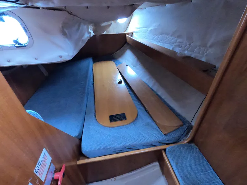 Slide: The Image of Interior of a 1990 Beneteau First 285 yacht cabin. - 15