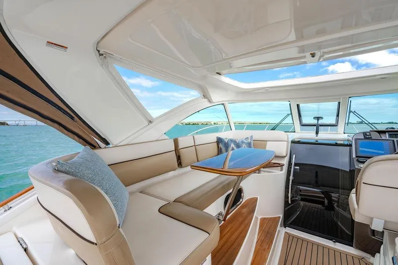 Slide: The Image of Luxurious interior of 2013 Tiara Yachts 3600 Coronet with elegant seating and ocean view. - 20