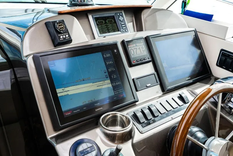 Slide: The Image of Control panel of 2013 Tiara Yachts 3600 Coronet with navigation screens and instruments. - 22