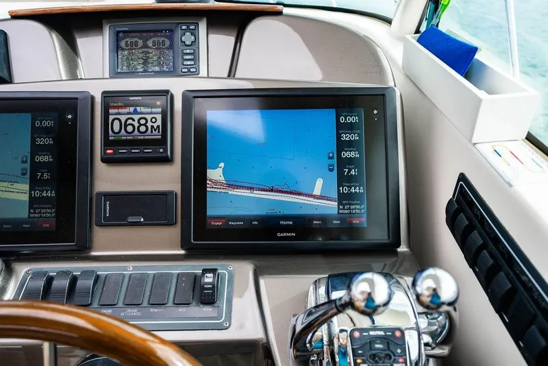 Slide: The Image of Dashboard of 2013 Tiara Yachts 3600 Coronet with Garmin navigation displays. - 23
