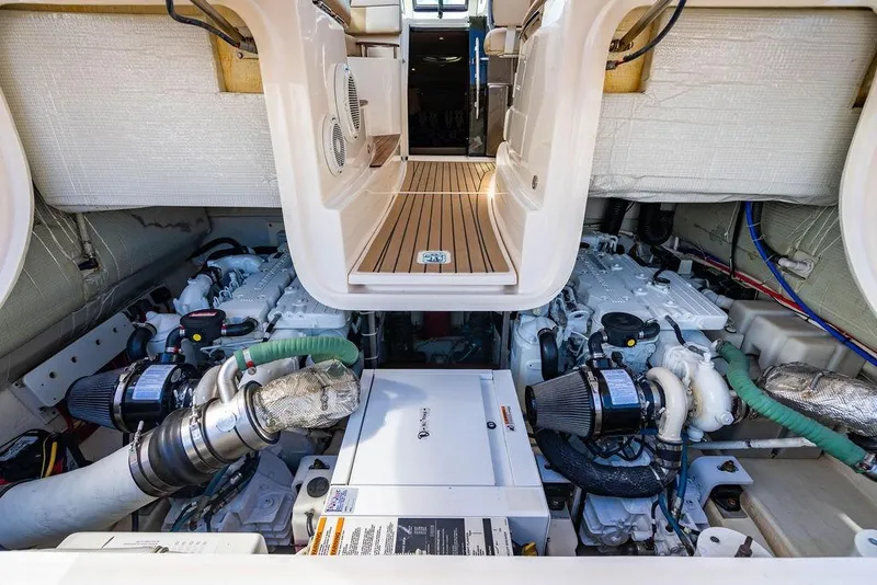 Slide: The Image of Engine room of 2013 Tiara Yachts 3600 Coronet, showcasing dual engines and equipment. - 36