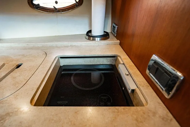 Slide: The Image of Modern kitchen area in 2013 Tiara Yachts 3600 Coronet with built-in stove. - 5