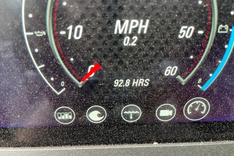 Slide: The Image of Dashboard of 2024 Malibu Wakesetter 26 LSV showing 0.2 MPH and 92.8 hours. - 14
