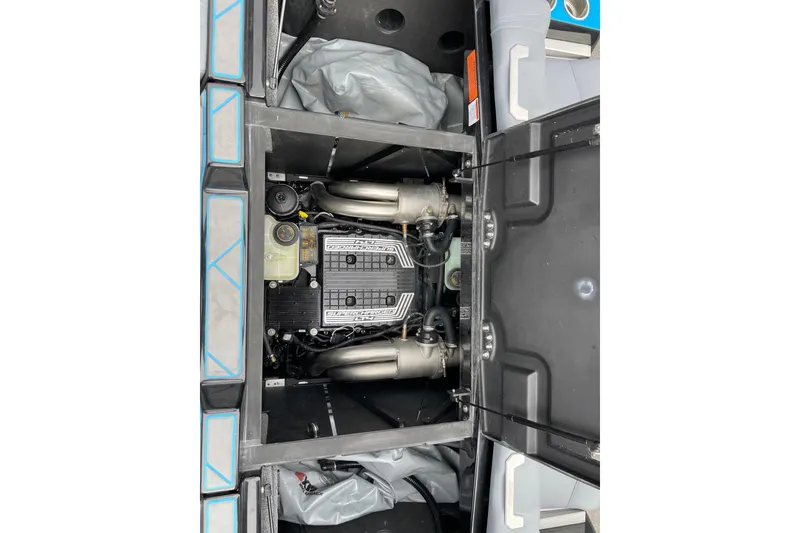 Slide: The Image of 2024 Malibu Wakesetter 26 LSV engine compartment, showcasing powerful supercharged engine. - 15