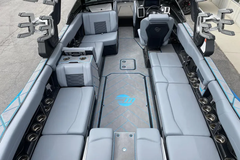 Slide: The Image of 2024 Malibu Wakesetter 26 LSV interior with spacious seating and modern design. - 6