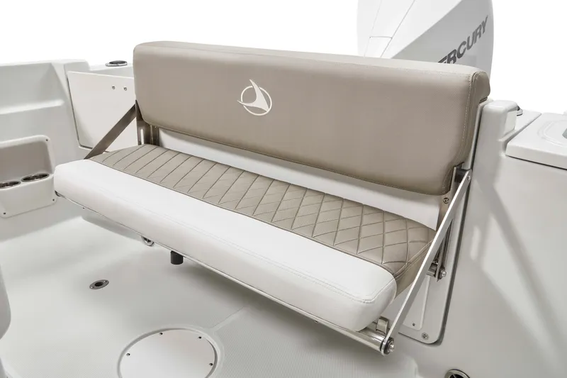 Slide: The Image of 2024 Finseeker 220 CC boat seat with beige and white cushioned design. - 10