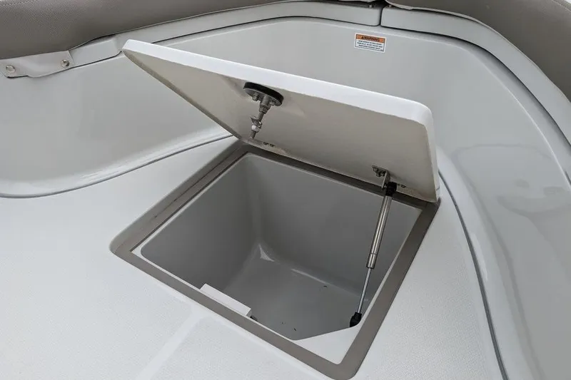 Slide: The Image of Open storage compartment on 2024 Finseeker 220 CC boat. - 15