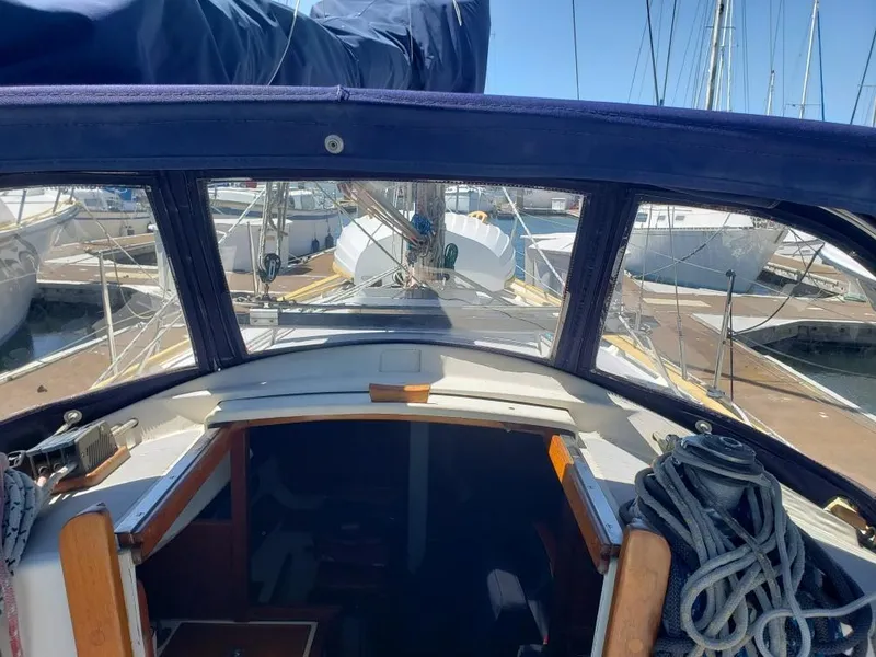 Slide: The Image of Interior view of a 1990 Contessa 32 yacht in harbor. - 11