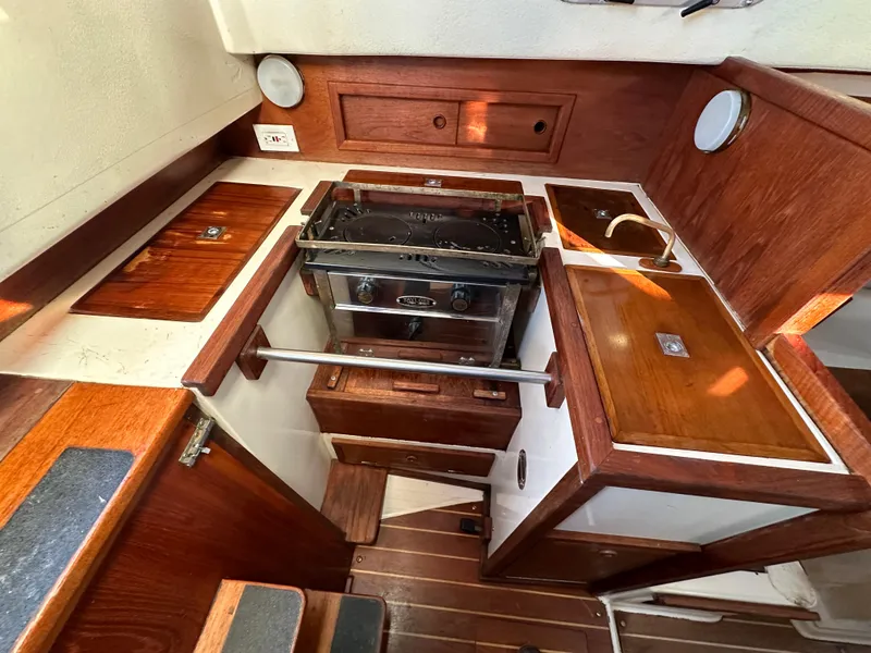 Slide: The Image of Interior of a 1990 Contessa 32 yacht with wooden fittings. - 25