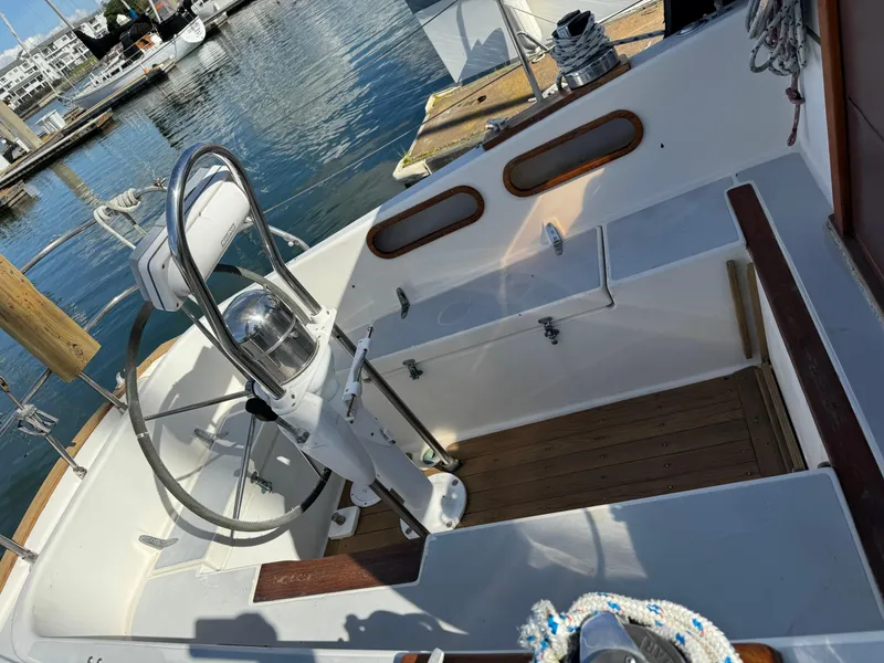 Slide: The Image of Cockpit of a 1990 Contessa 32 yacht in harbor. - 28