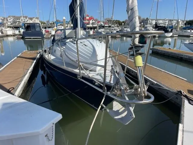 Slide: The Image of 1990 Contessa 32 sailboat docked in marina. - 8