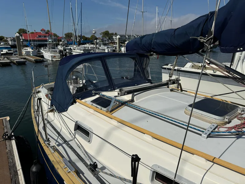 Slide: The Image of 1990 Contessa 32 sailboat docked in marina. - 9