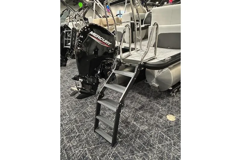 Slide: The Image of 2026 Harris Cruiser 230 boat with Mercury engine and boarding ladder. - 5