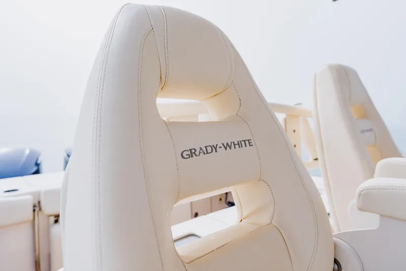 Slide: The Image of 2021 Grady-White Canyon 306 boat seats with logo, showcasing luxury and comfort. - 30