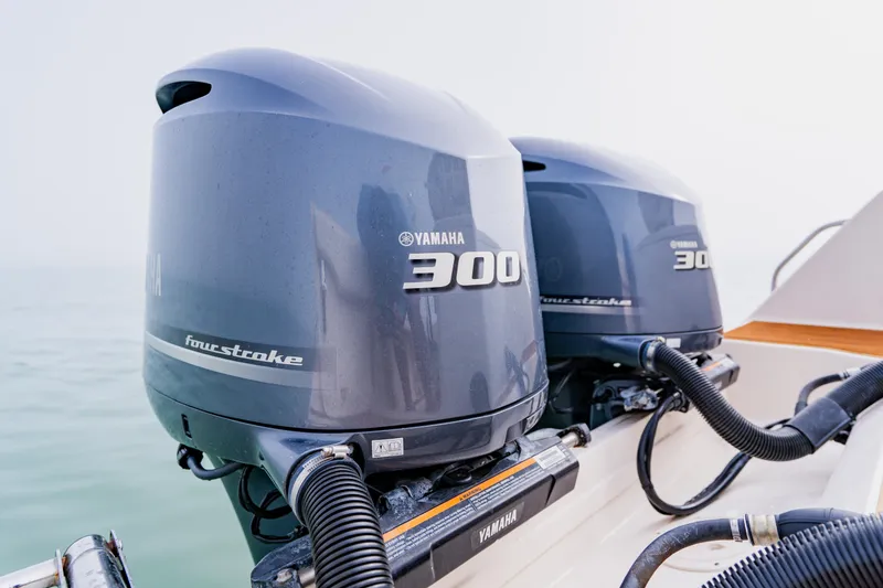 Slide: The Image of Twin Yamaha 300 four-stroke engines on 2021 Grady-White Canyon 306 boat. - 42