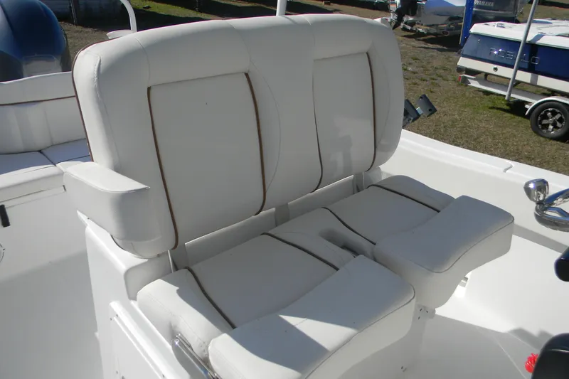 Slide: The Image of White seating on 2022 Sea Hunt Ultra 234 boat, featuring comfortable design and modern upholstery. - 5