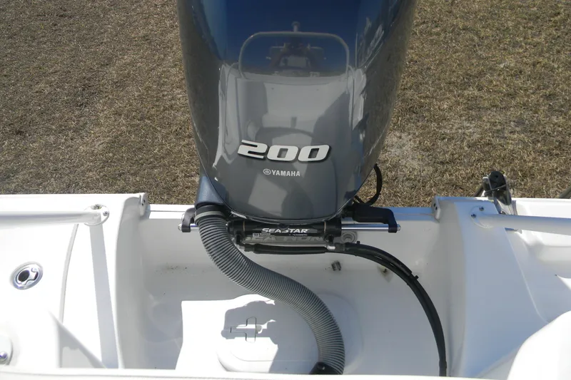 Slide: The Image of 2022 Sea Hunt Ultra 234 boat with Yamaha 200 engine, featuring SeaStar hydraulic steering. - 7
