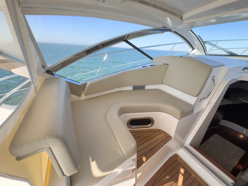 Slide: The Image of Interior of 2015 Pursuit SC 365i Sport Coupe with ocean view. - 11