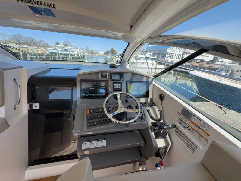 Slide: The Image of Interior view of 2015 Pursuit SC 365i Sport Coupe cockpit. - 13