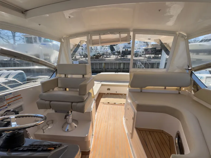 Slide: The Image of Interior of 2015 Pursuit SC 365i Sport Coupe with seating area. - 16