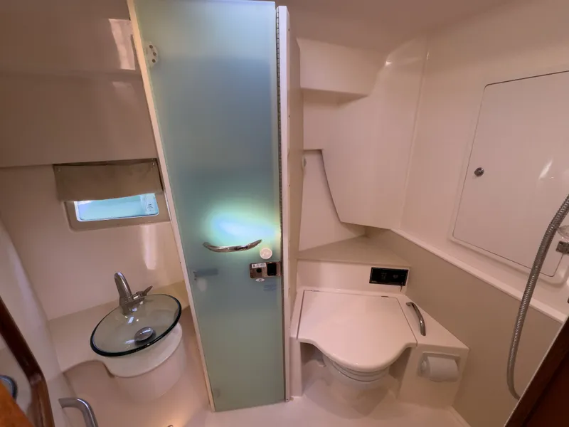Slide: The Image of Bathroom in 2015 Pursuit SC 365i Sport Coupe. - 25
