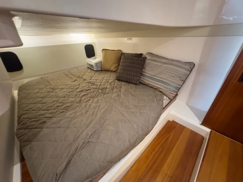 Slide: The Image of Interior of 2015 Pursuit SC 365i Sport Coupe with cozy bed. - 35