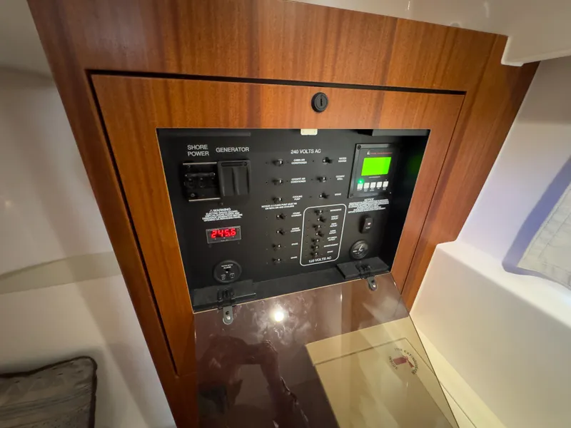 Slide: The Image of Electrical control panel of 2015 Pursuit SC 365i Sport Coupe. - 37