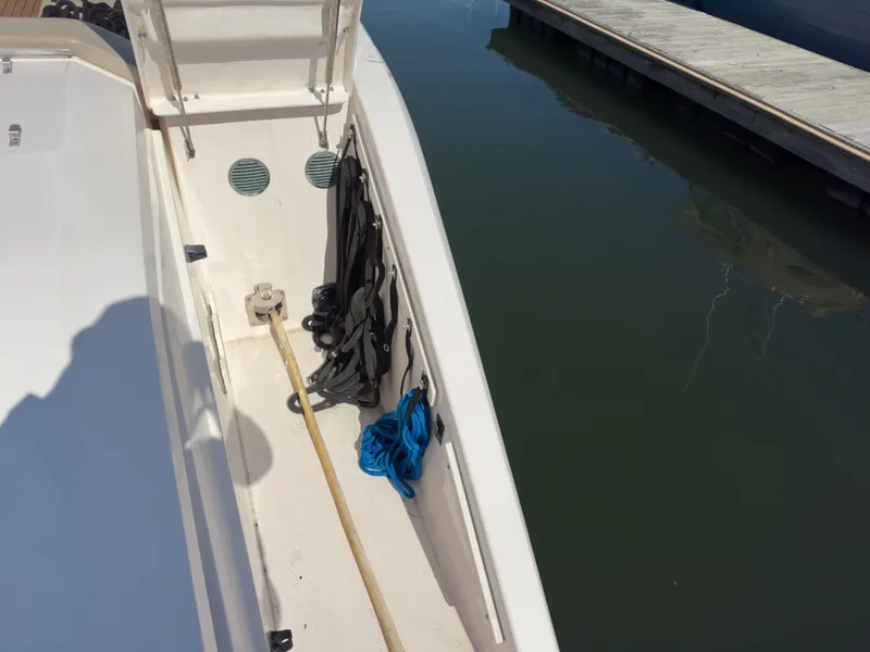 Slide: The Image of Storage area of 2015 Pursuit SC 365i Sport Coupe at dock. - 42