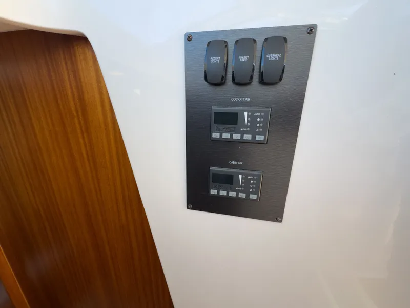 Slide: The Image of Control panel of Pursuit SC 365i Sport Coupe 2015. - 46