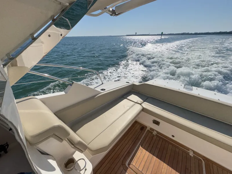 Slide: The Image of Pursuit SC 365i Sport Coupe 2015 cruising on open sea. - 5