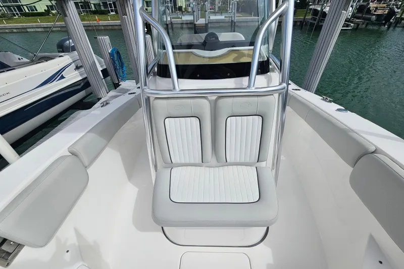 Slide: The Image of 2020 Sea Fox 228 Commander boat interior with cushioned seating and sleek design. - 10