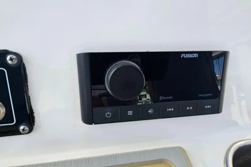 Slide: The Image of Fusion audio system on 2020 Sea Fox 228 Commander boat dashboard. - 26
