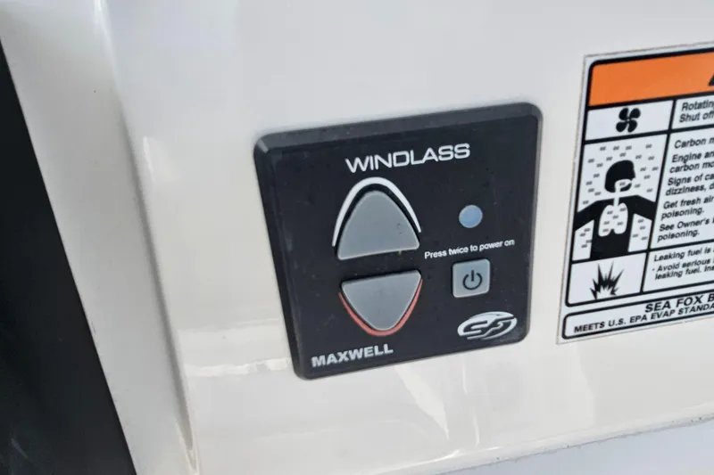 Slide: The Image of Control panel of a 2020 Sea Fox 228 Commander boat with windlass buttons. - 27