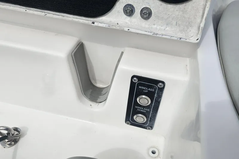 Slide: The Image of 2020 Sea Fox 228 Commander windlass control panel on white boat deck. - 9