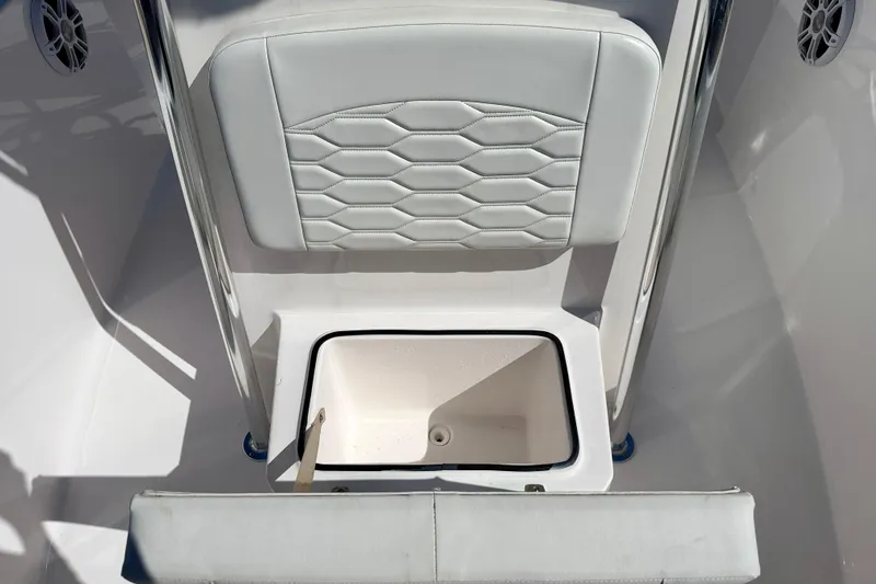 Slide: The Image of 2023 Aquasport 2200 Center Console boat seat with storage compartment. - 12
