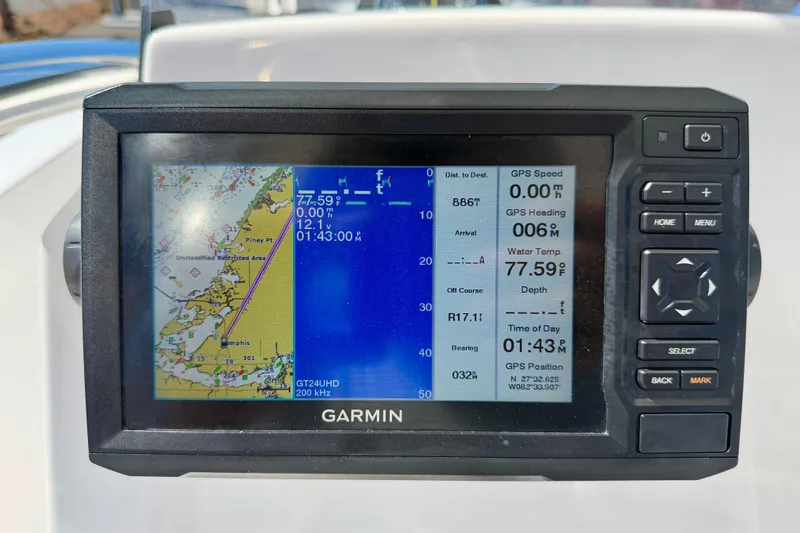 Slide: The Image of Garmin GPS display on 2023 Aquasport 2200 Center Console, showing navigation and water temperature. - 17