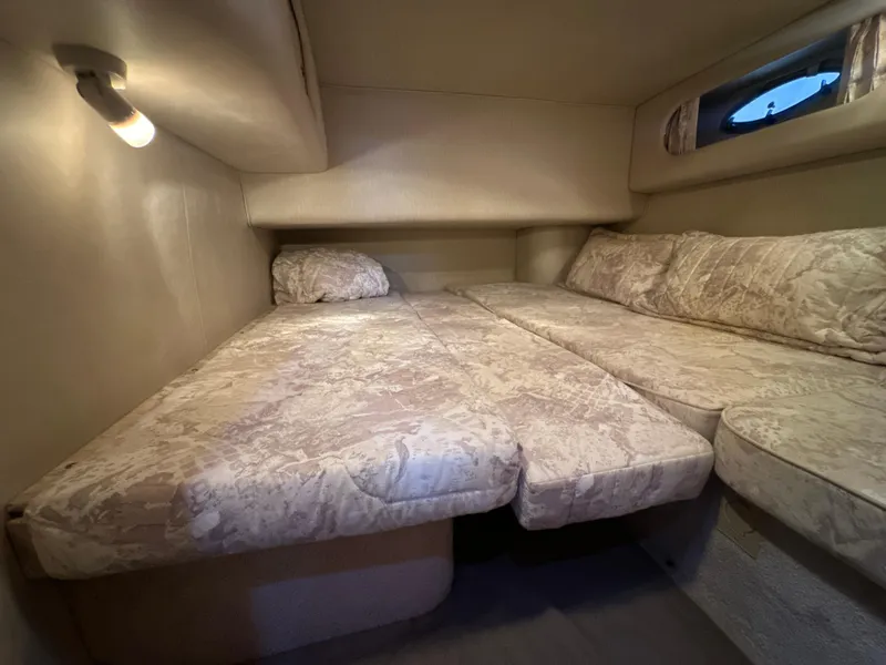 Slide: The Image of Interior of 1997 Sea Ray 400 Sedan Bridge with sleeping area. - 46