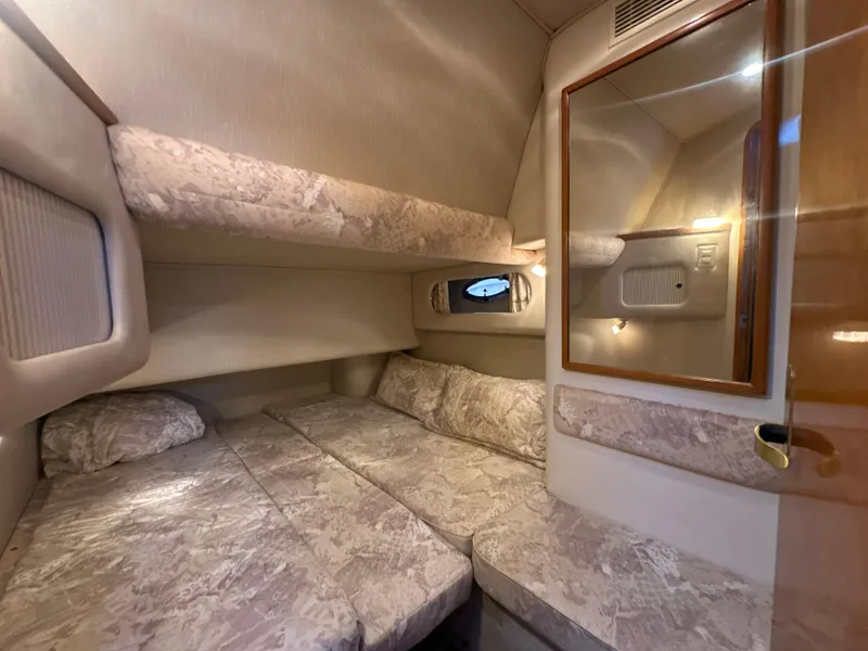 Slide: The Image of Interior of 1997 Sea Ray 400 Sedan Bridge, cozy sleeping cabin. - 47