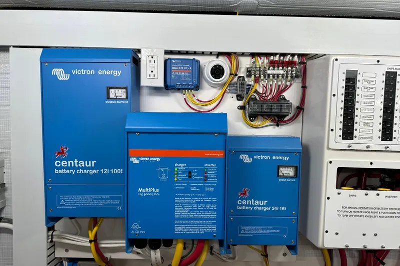 Slide: The Image of Electrical system with Victron Energy chargers on Sabre 48 Salon Express, 2025 model. - 13