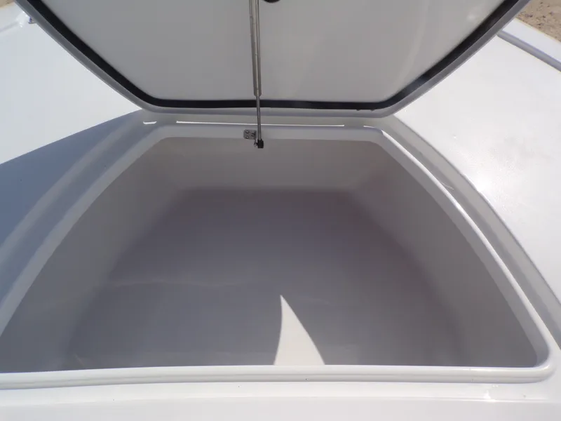 Slide: The Image of Open storage compartment in Tidewater 2500 Carolina Bay 2026 boat. - 27