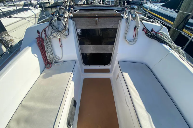 Slide: The Image of Cockpit of 1994 Hunter 33.5 sailboat with seating and rigging. - 3